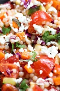 This Spicy Israeli Couscous Salad is easy to throw together and so vibrant in colors and flavors!