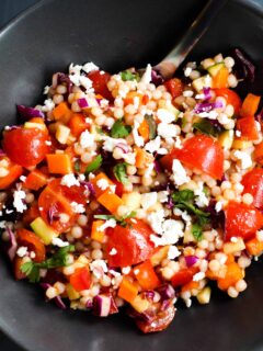 This Spicy Israeli Couscous Salad is easy to throw together and so vibrant in colors and flavors!