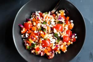 This Spicy Israeli Couscous Salad is easy to throw together and so vibrant in colors and flavors!