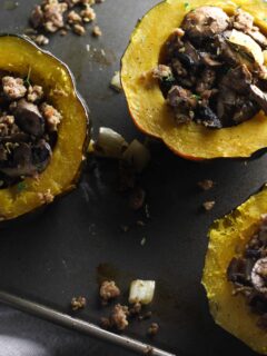 This Roasted Acorn Squash with Sausage, Fennel, and Mushrooms is an easy dish with warm fall flavors!