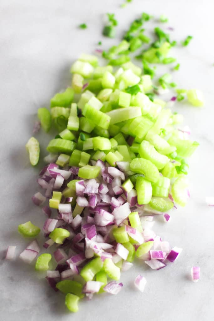 This Purple Potato Salad is an easy dish to throw together, bring to a tailgate, and show your team spirit!