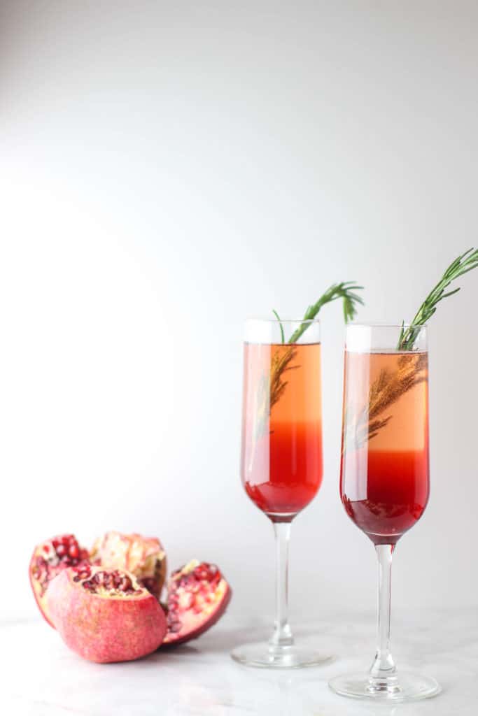 This Pomegranate Rosemary Spritzer is a fruity and herby take on a typical toast!