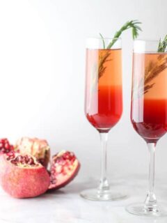 This Pomegranate Rosemary Spritzer is a fruity and herby take on a typical toast!