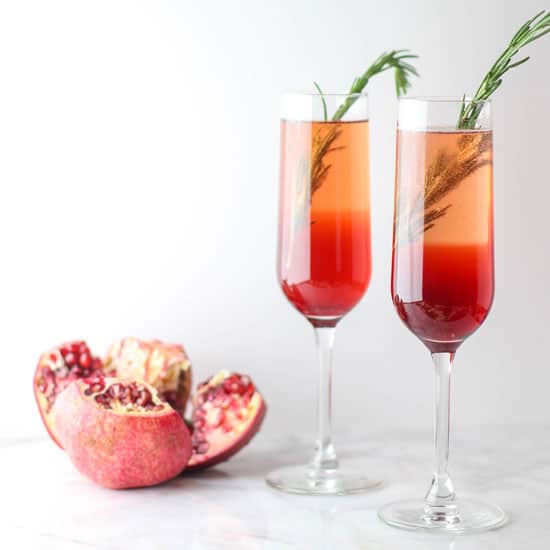 This Pomegranate Rosemary Spritzer is a fruity and herby take on a typical toast!