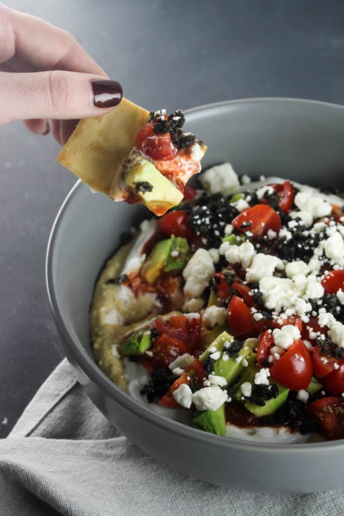 This Mediterranean Seven Layer Dip is an easy and flavorful new take on the classic!