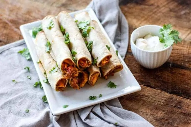 These Baked Chicken Taquitos are full of flavor and make for a great snack or appetizer!