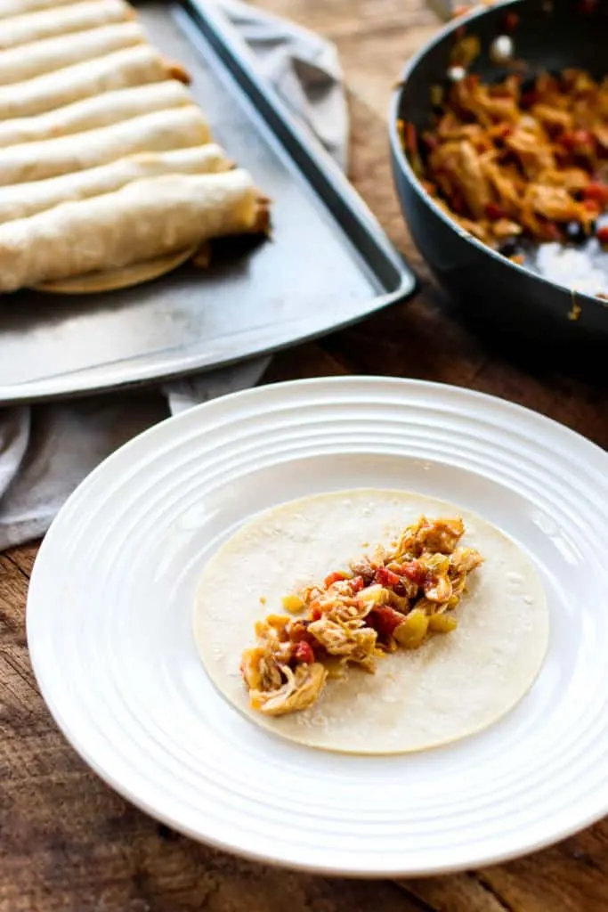 These Baked Chicken Taquitos are full of flavor and make for a great snack or appetizer!