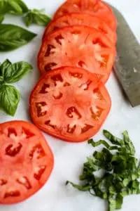 This Baked Chicken Caprese is full of bright summery flavors and is so easy to throw together!