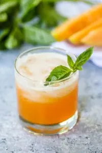 This Cantaloupe Basil Cooler is light, refreshing, and summer in a glass!