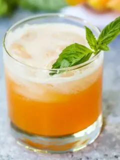 This Cantaloupe Basil Cooler is light, refreshing, and summer in a glass!