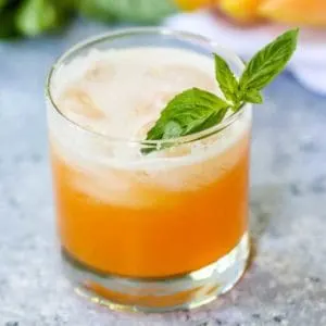 This Cantaloupe Basil Cooler is light, refreshing, and summer in a glass!