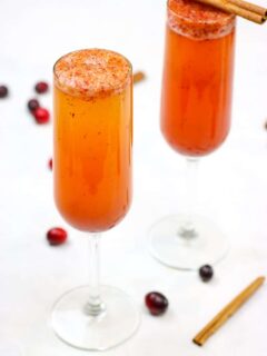 These Spiced Cranberry Cider Mimosas are perfect for your holiday festivities!