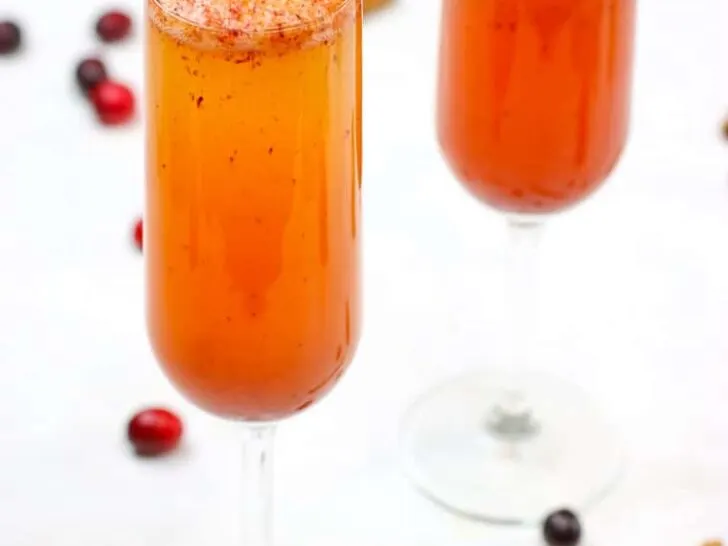 These Spiced Cranberry Cider Mimosas are perfect for your holiday festivities!