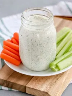 This Greek Yogurt Ranch Dip recipe is a quick and easy way to make a low calorie version of your favorite dip!