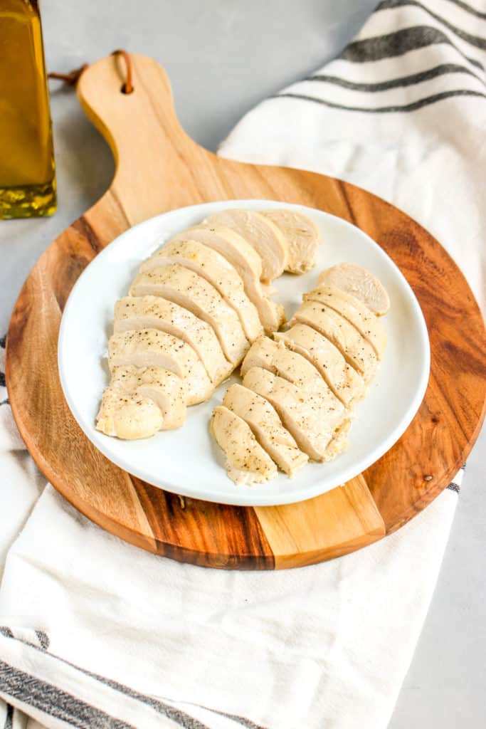 a close up of two sliced and finished chicken breasts