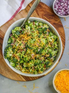 This easy Broccoli Salad with Bacon will become a classic for all of your potlucks and tailgates with just a few ingredients needed to bring it together.