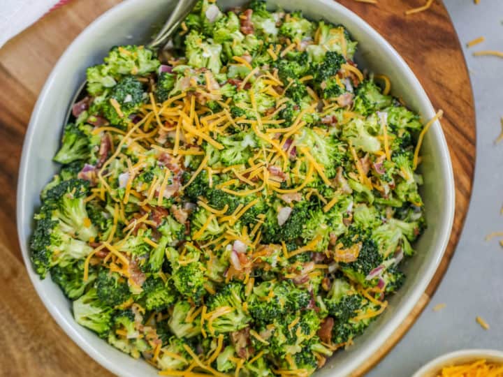 This easy Broccoli Salad with Bacon will become a classic for all of your potlucks and tailgates with just a few ingredients needed to bring it together.