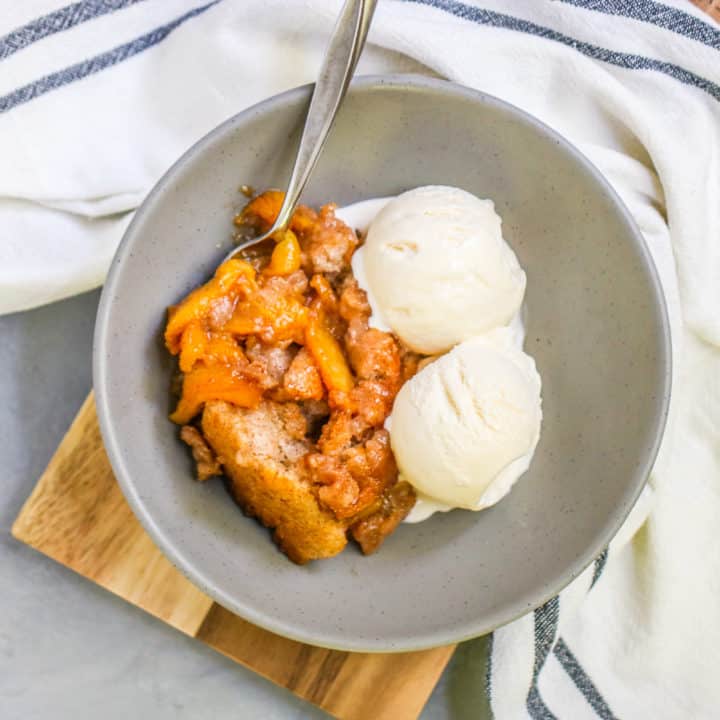 If you’re looking for a recipe for an easy peach cobbler with fresh peaches, look no further! This easy peach cobbler recipe is one that my family has been making forever.