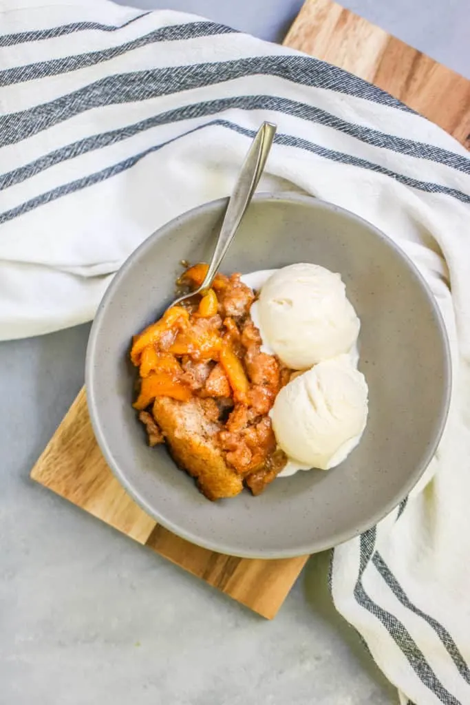 If you’re looking for a recipe for an easy peach cobbler with fresh peaches, look no further! This easy peach cobbler recipe is one that my family has been making forever.