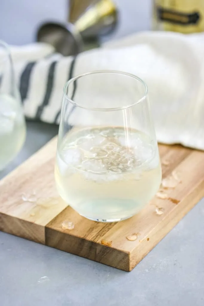 This Sparkling Elderflower Lemonade will quickly become your favorite drink of summer! It’s an adult floral lemonade topped with champagne. What’s not to love?