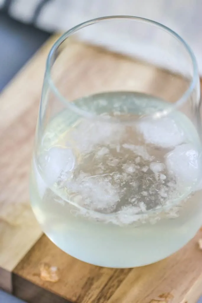 This Sparkling Elderflower Lemonade will quickly become your favorite drink of summer! It’s an adult floral lemonade topped with champagne. What’s not to love?