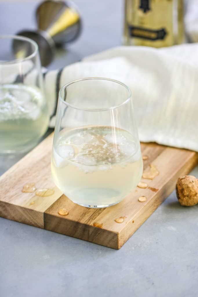 This Sparkling Elderflower Lemonade will quickly become your favorite drink of summer! It’s an adult floral lemonade topped with champagne. What’s not to love?