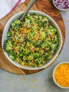 This easy Broccoli Salad with Bacon will become a classic for all of your potlucks and tailgates with just a few ingredients needed to bring it together.