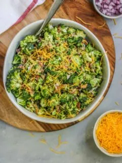 This easy Broccoli Salad with Bacon will become a classic for all of your potlucks and tailgates with just a few ingredients needed to bring it together.