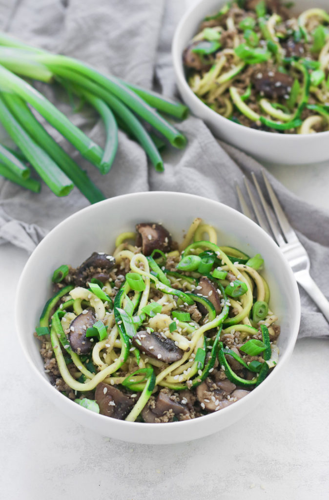 two bowls of sesame zoodles with ground turkey