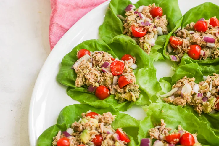 a close up of the platter of the 6 tuna avocado lettuce wraps