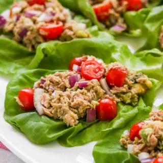 a close up image of the tuna avocado lettuce wraps