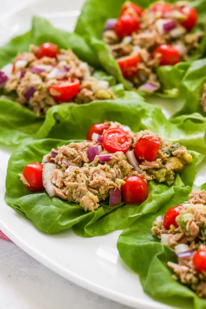 a close up image of the tuna avocado lettuce wraps