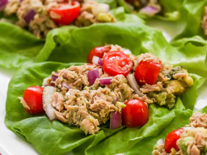 a close up image of the tuna avocado lettuce wraps