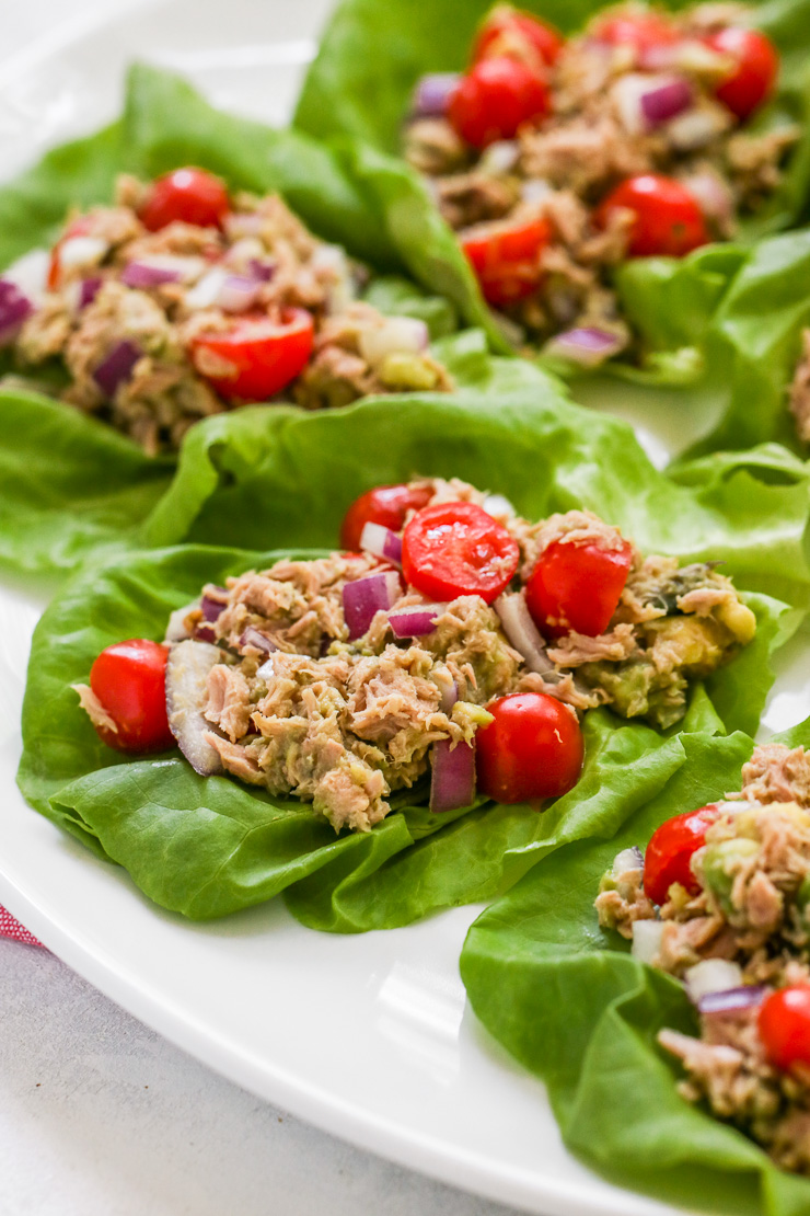 a close up image of the tuna avocado lettuce wraps