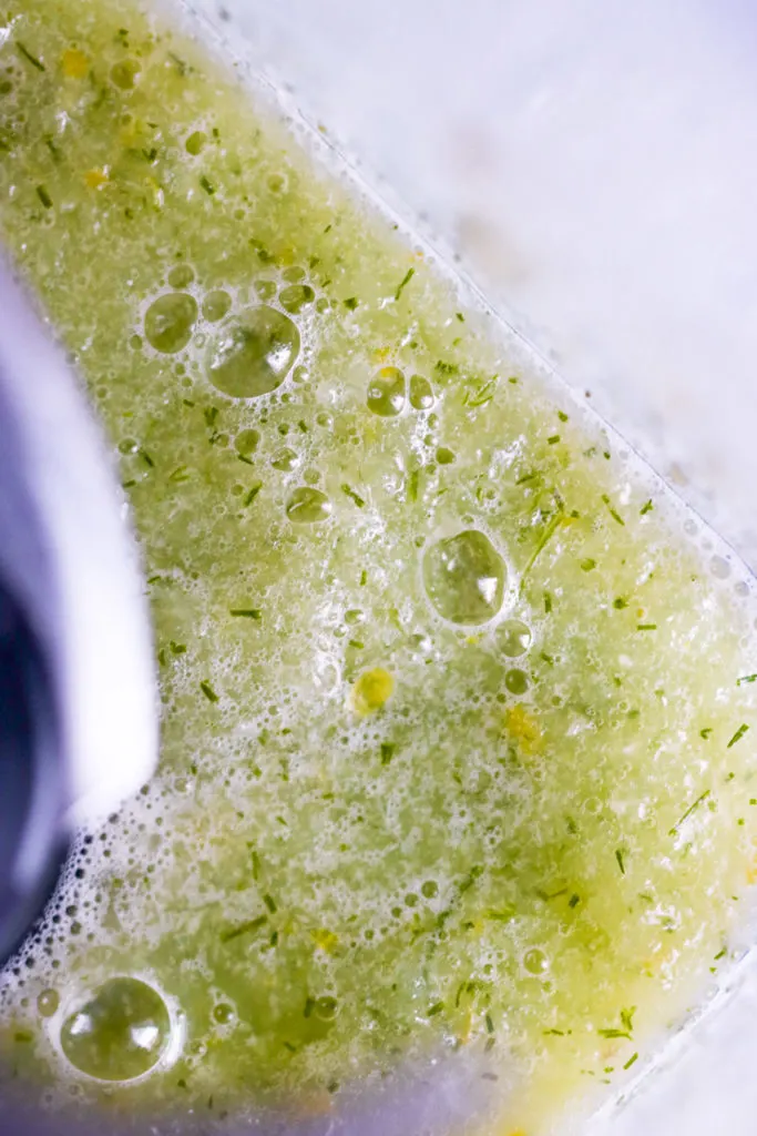 blended cucumber, lemon, and dill in a blender