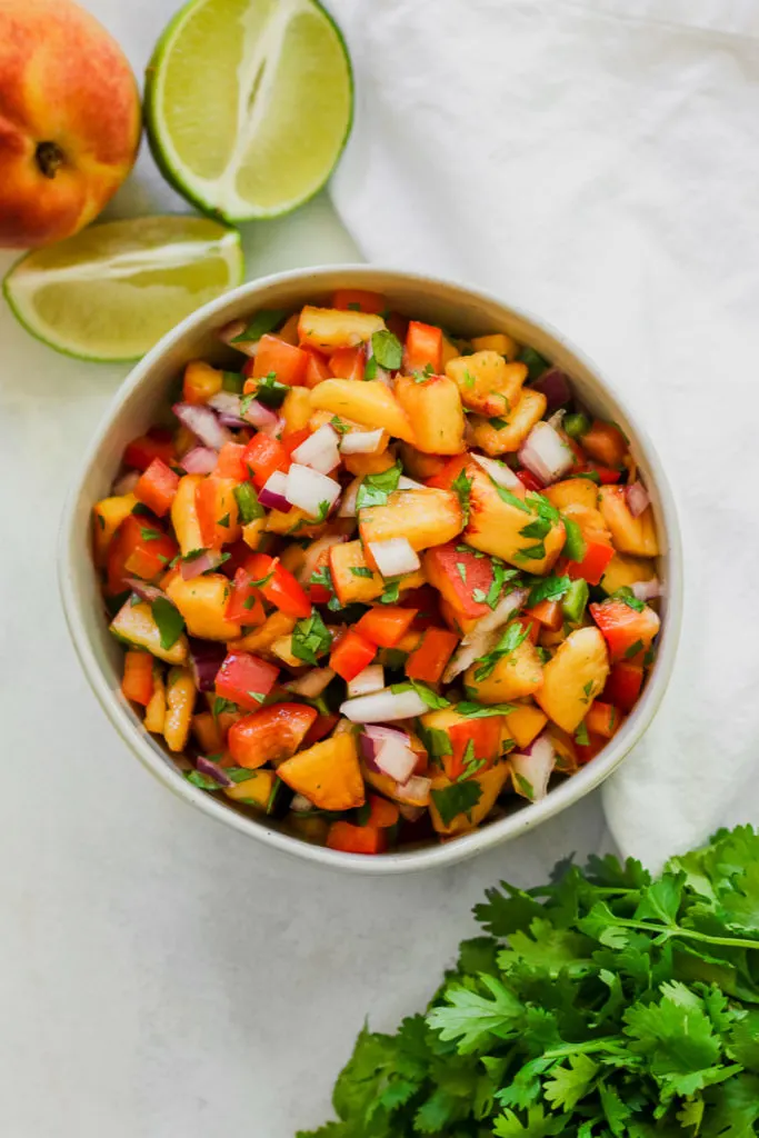 overhead close up of peach salsa in a bowl