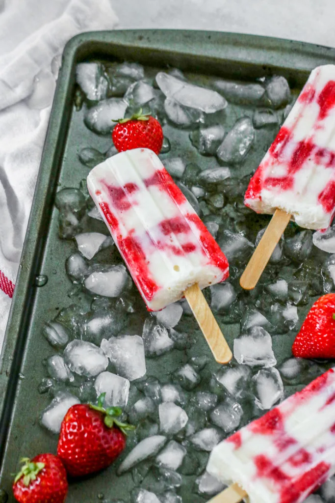 a closeup of a strawberry yogurt popsicle