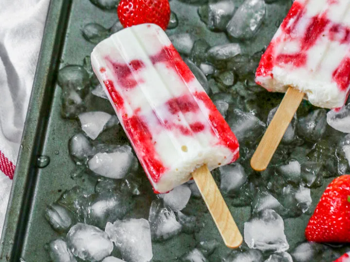 a closeup of a strawberry yogurt popsicle