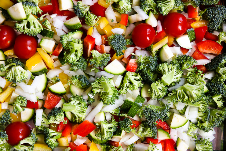 a close up of cut, raw vegetables