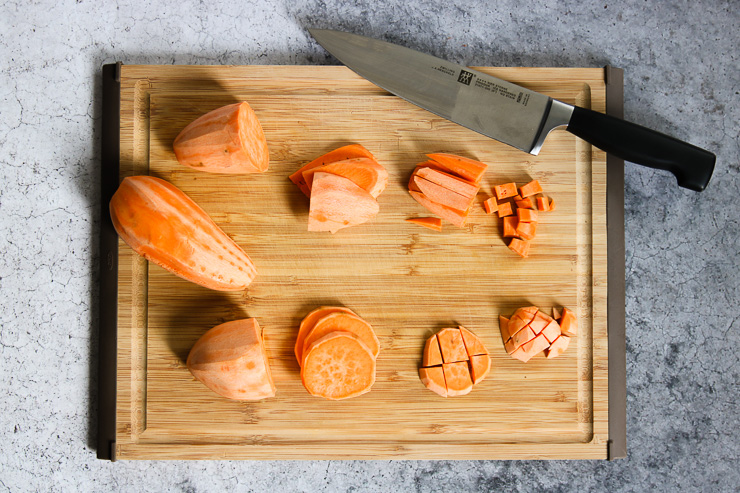 An overhead shot of sweet potatoes being cut in different ways