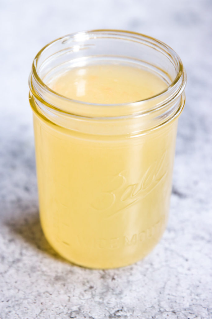 A mason jar filled with Homemade Sour Mix