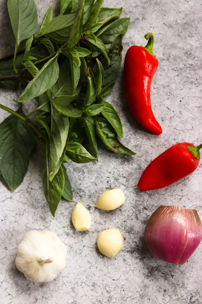 thai basil, red chilies, garlic, and a shallot