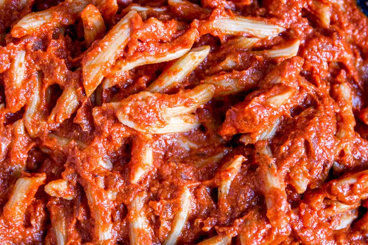 a close up of penne in vodka sauce