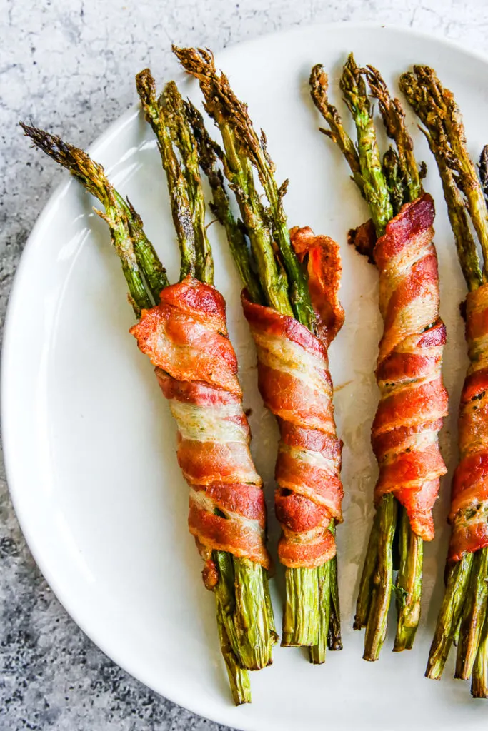 four air fryer bacon wrapped asparagus bundles