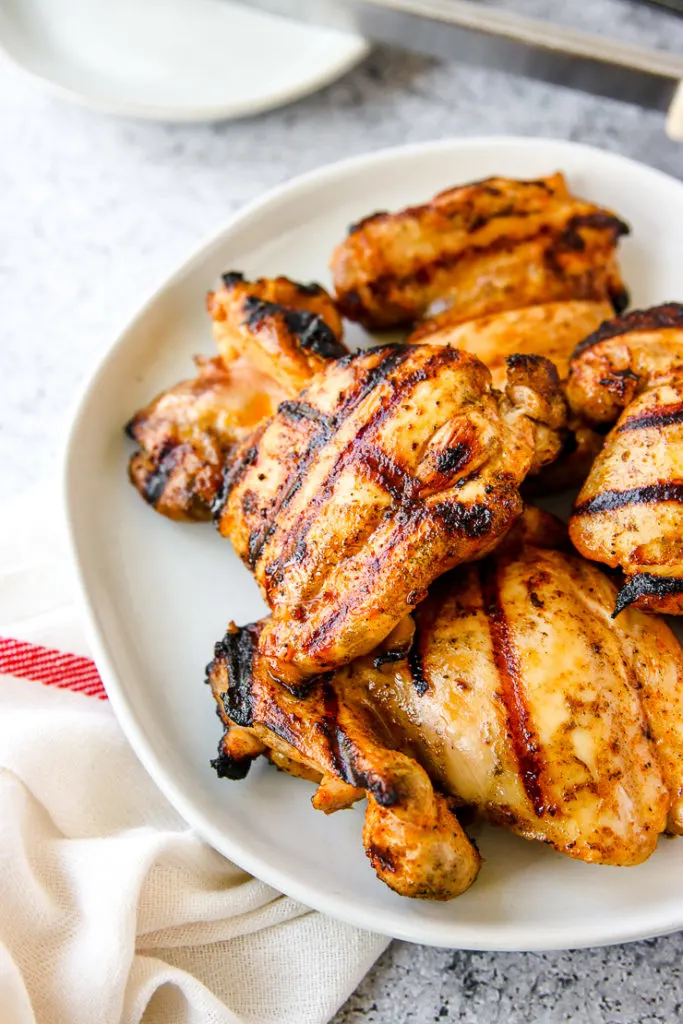 a close up of grill marks on boneless skinless chicken thighs