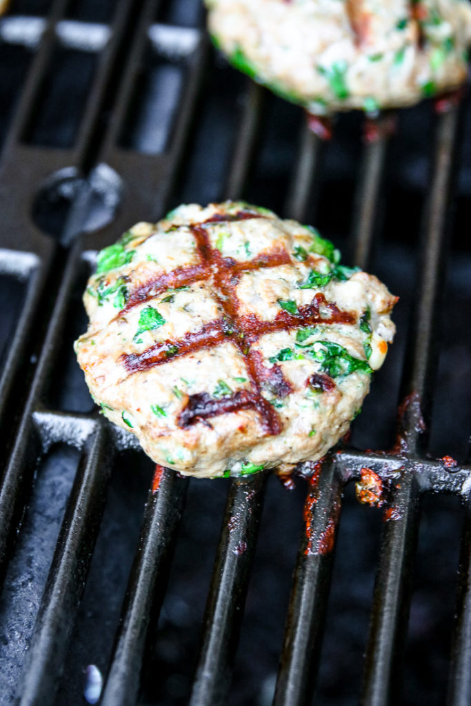 a spinach feta turkey burger on the grill