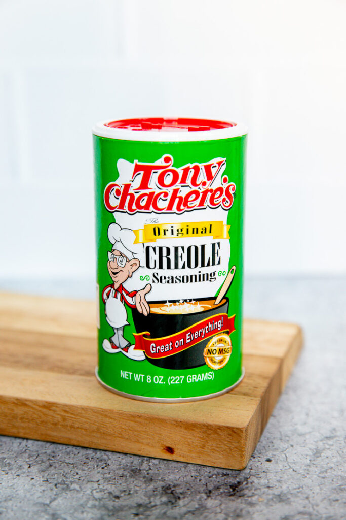 a close up image of a Tony Chachere's Creole Seasoning container