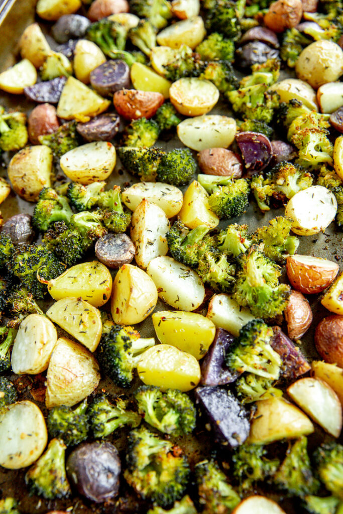 roasted potatoes and broccoli seasoned with thyme and oregano