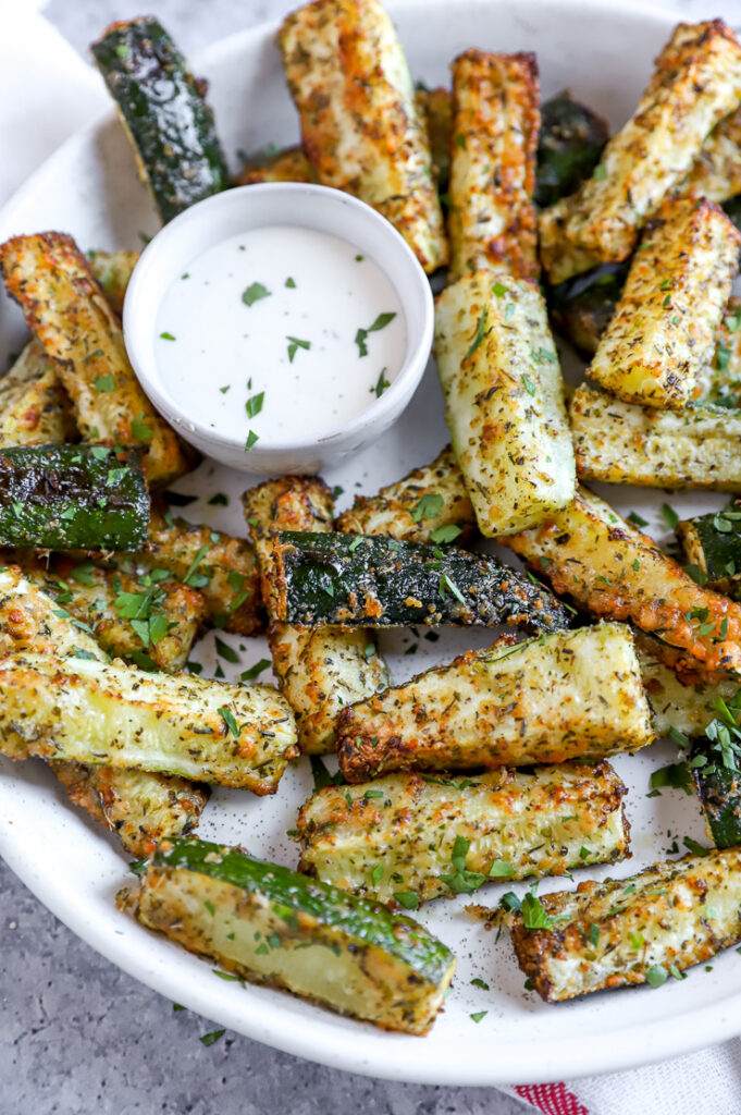 a close up of browned air fryer zucchini fries