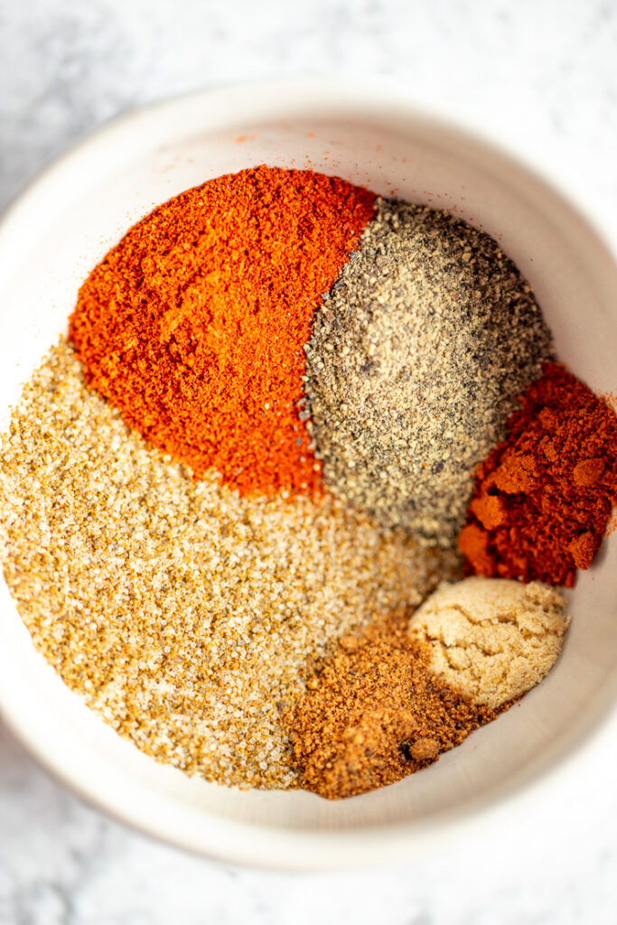 A bowl of all of the spices before they are mixd together.